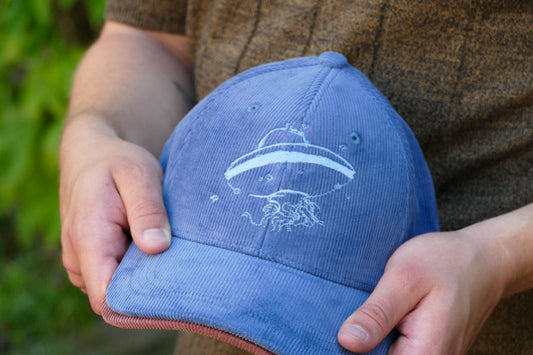 Cap "Die Andere Seite der Welt 2025"